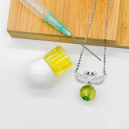 Sterling Silver Twin Swan Aroma Necklace - Gold Green | Energy &amp; Healing | Diffuse on the go