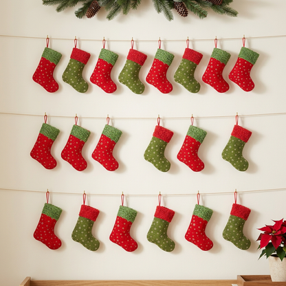 Snowflake Christmas stocking gift bags hanging on a wall